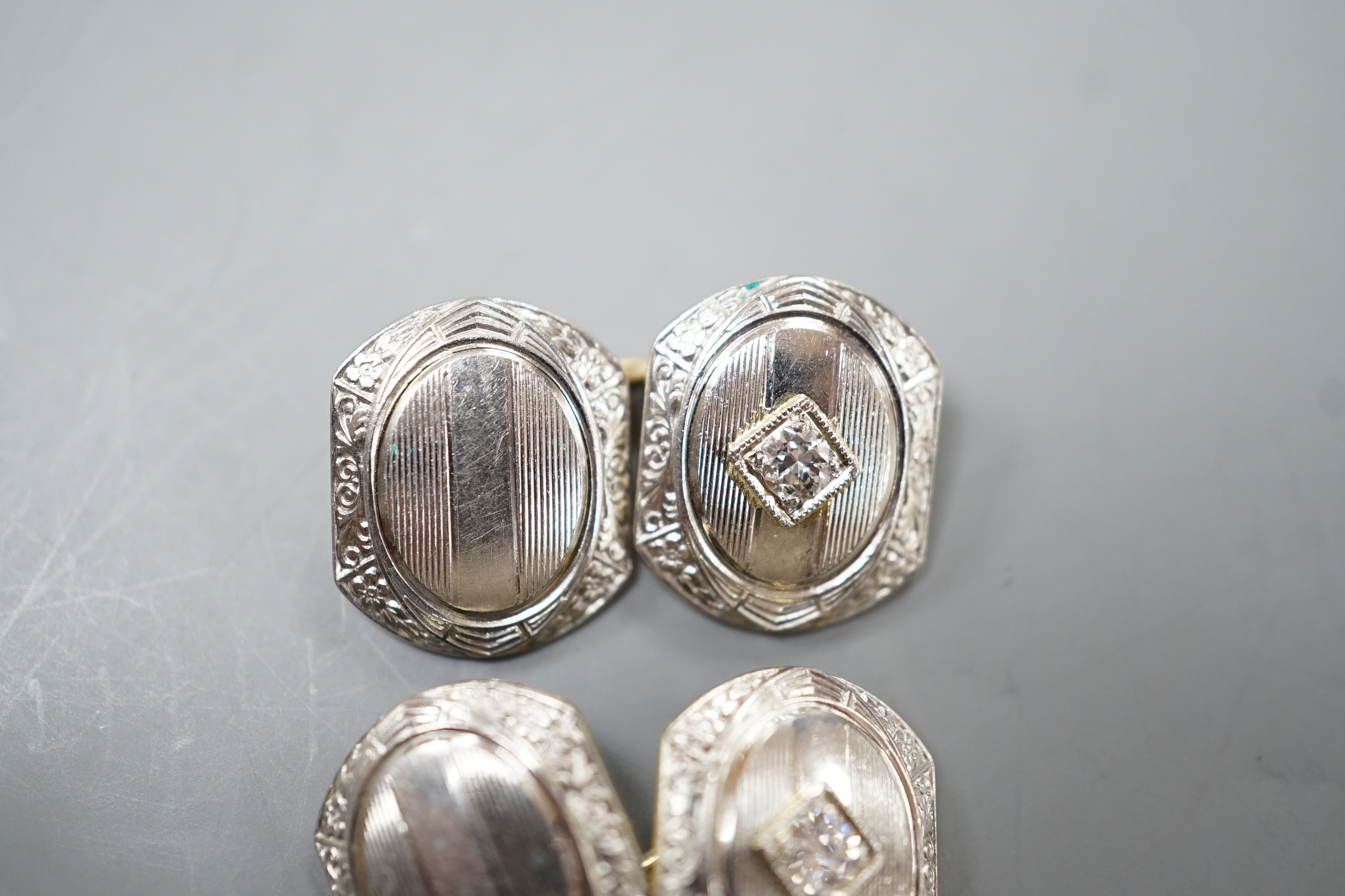 A pair of two colour 14k and diamond set shaped hexagonal cufflinks, 13mm, 9.6 grams.